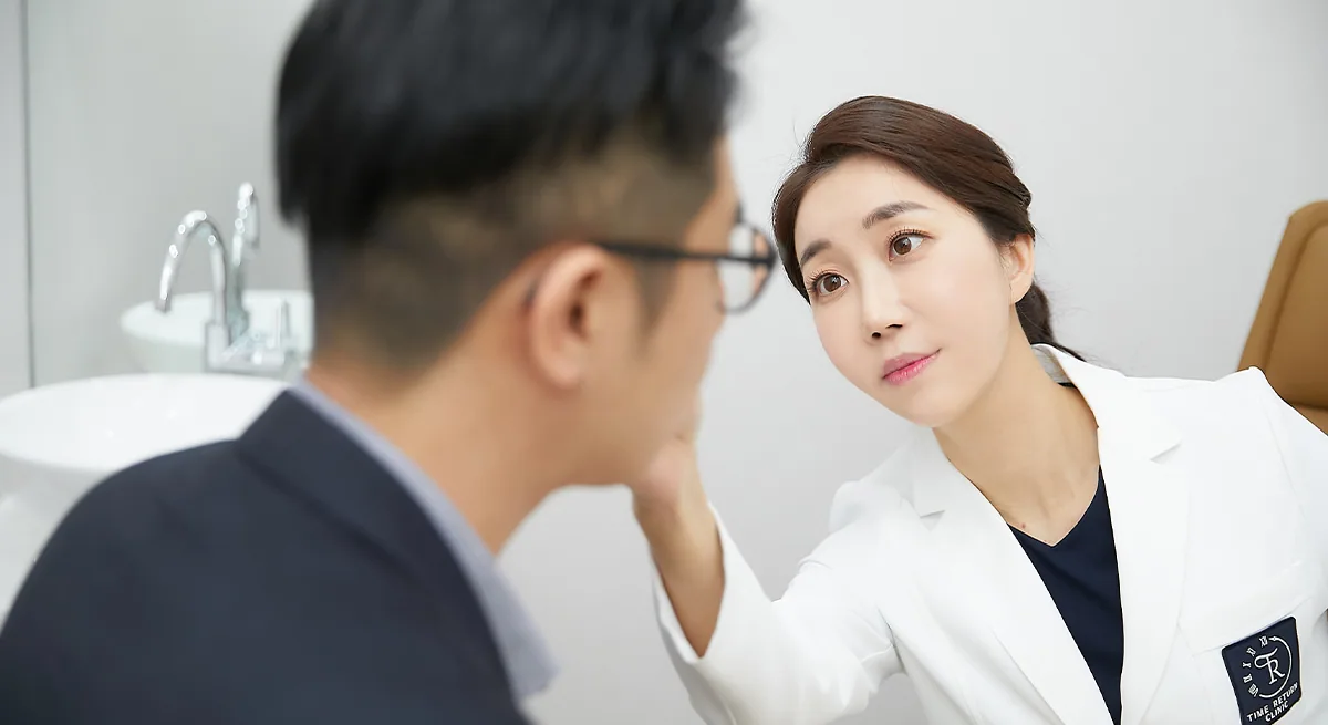 Doctor consulting a patient face to face at Time Return Clinic in Seoul